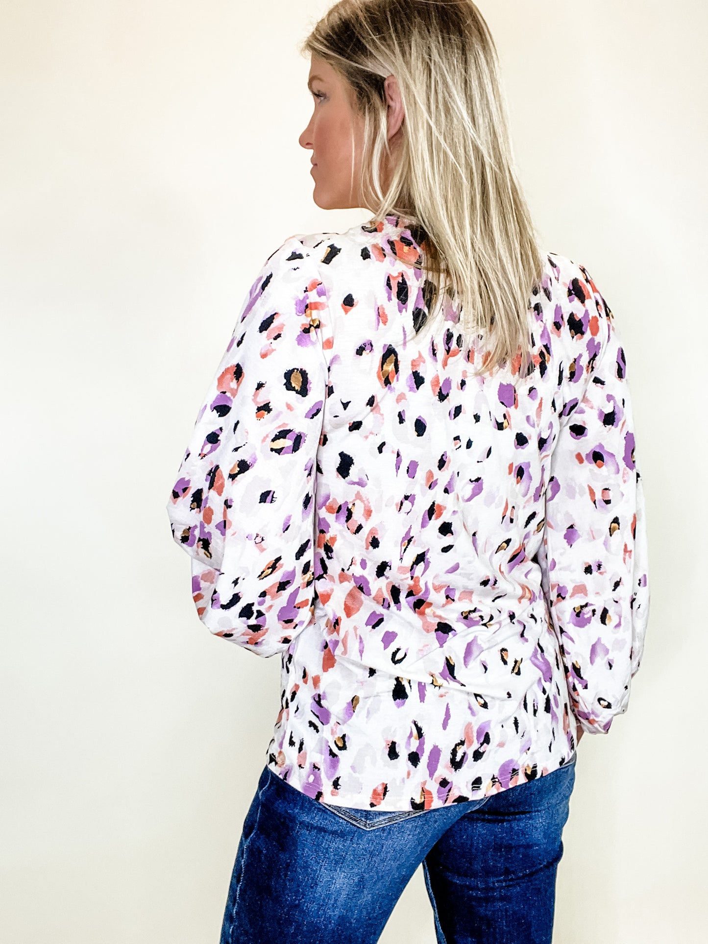 Feeling Elegant Coral & Lilac Animal Print Bubble Sleeve Top.