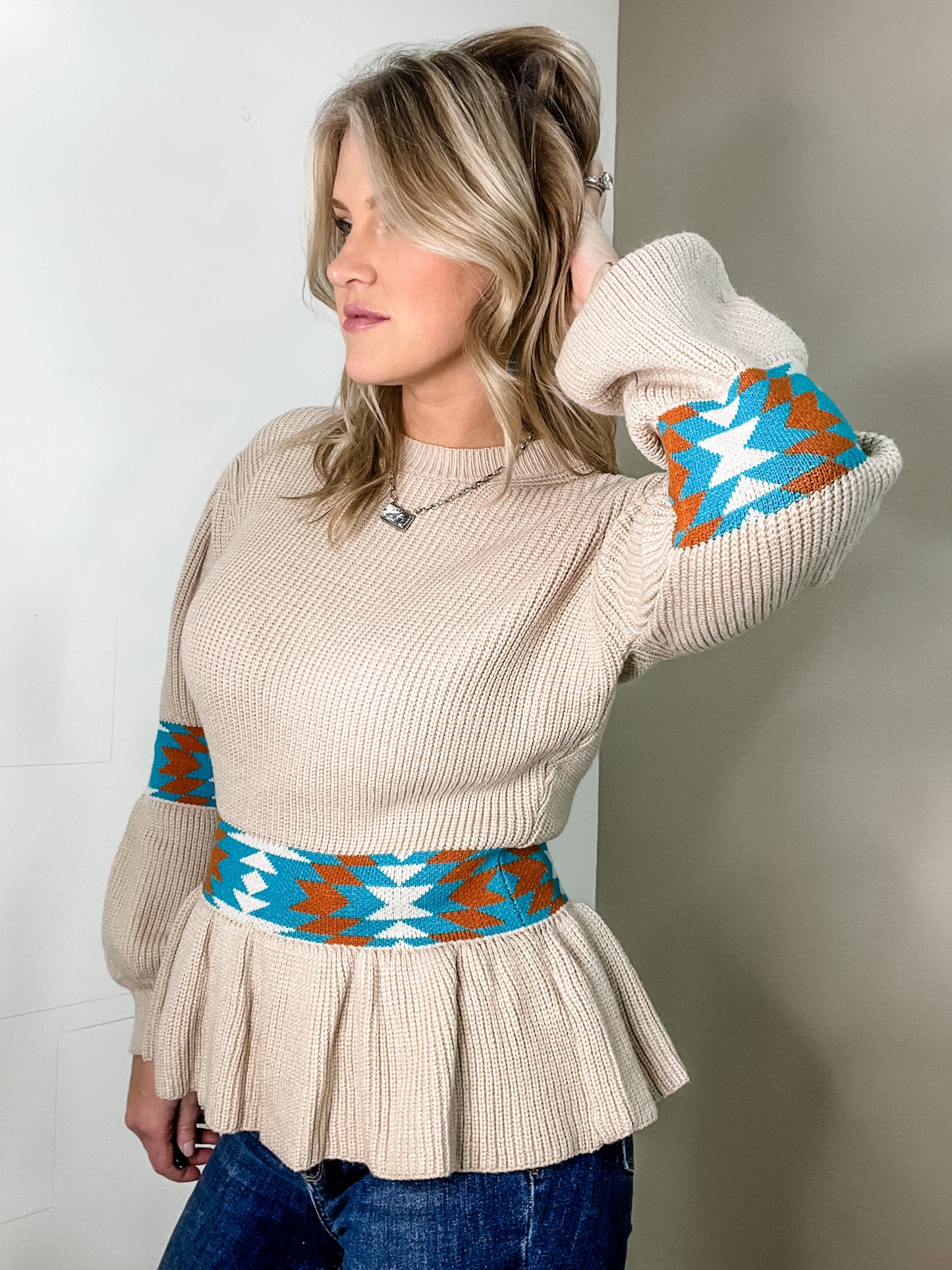 Long Sleeve Peplum Knit Sweater In Southwest Aztec